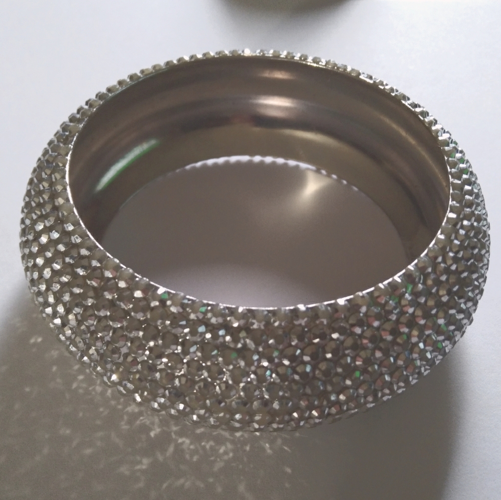 Silver diamond bangle bracelet.